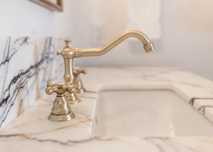 The Gilded Lady - The Cypress Apartment Pensacola